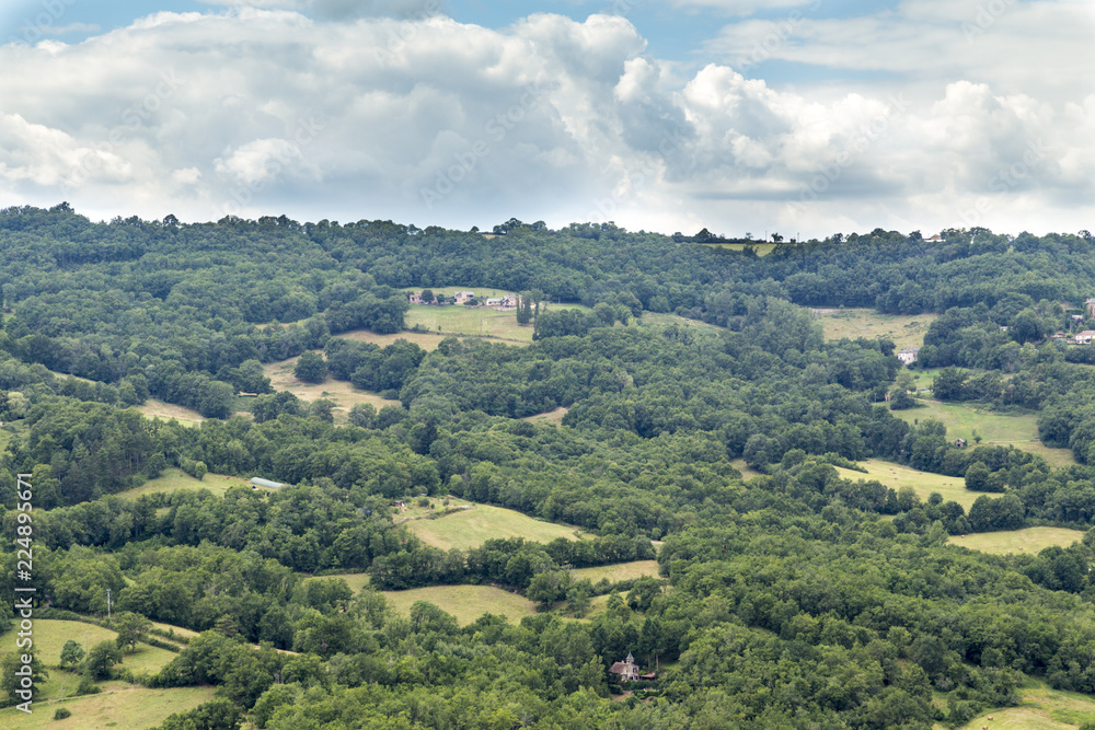 Naklejka premium Patchwork hillside in the mountains of the Aveyron near Najac in France