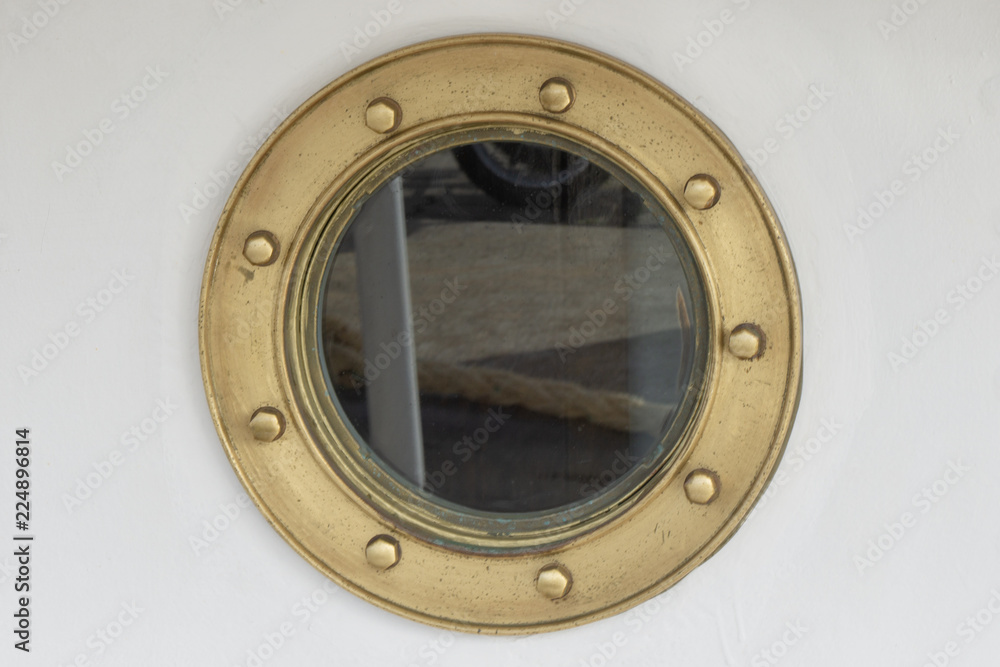 porthole of a ship porthole of a ship