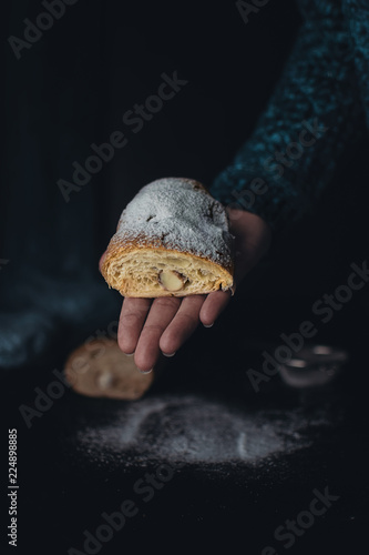 croissant in her hand