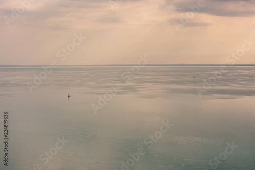 Foggy sunrise at the lake Balaton in autumn