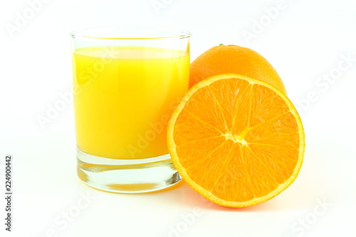 glass of orange juice and fresh orange fruits isolated on a white background