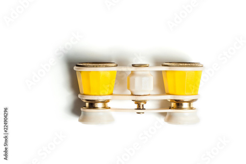 Vintage theatre binoculars isolated on white