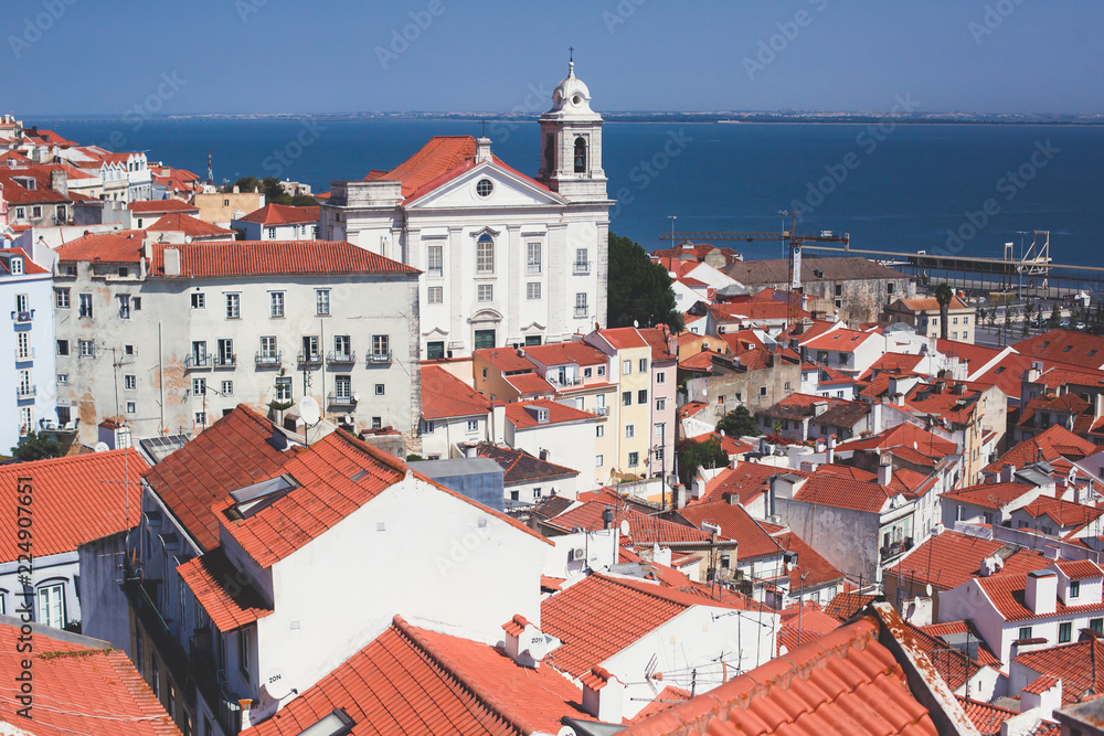 Fototapeta premium Beautiful super-wide angle aerial panoramic view of Lisbon, Portugal, with Alfama district and historical old town, seen from the observation deck belvedere