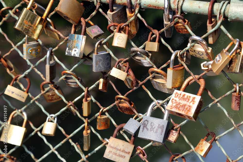 Lots of padlocks locked on a bridge. Locks bridge Lots of padlocks locked on a bridge. Locks bridge