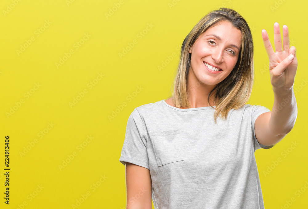 Young beautiful woman over isolated background showing and pointing up with fingers number three while smiling confident and happy. Young beautiful woman over isolated background showing and pointing up with fingers number three while smiling confident and happy.