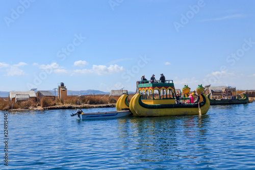 Uros people in boat of reeds
