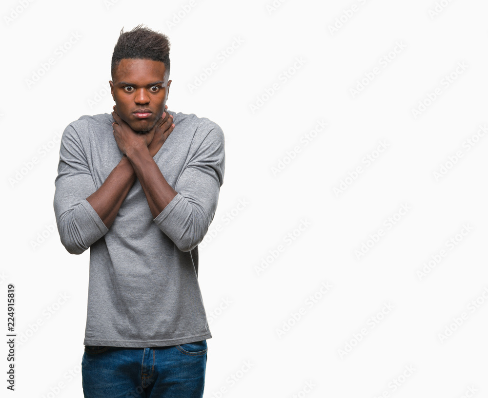 Young african american man over isolated background shouting and suffocate because painful strangle. Health problem. Asphyxiate and suicide concept.