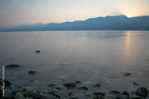 Mountain sunset over bay