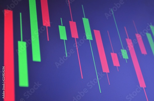 Exchange financial schedule with Japanese candles, out of focus