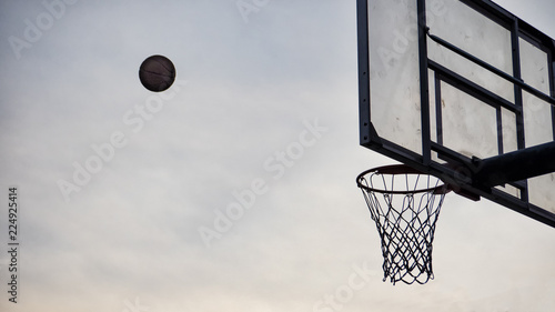Baskaetball flying into the hoop