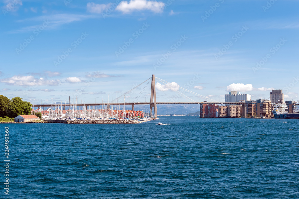 Fototapeta premium Norway, Stavanger region, Hogsfjorden. Hogsfiord. On a cruise to Lysefjord, Lysefiord. Leaving Stavanger behind. Stavanger Bridge. Rogaland, Ryfylke scenic route.