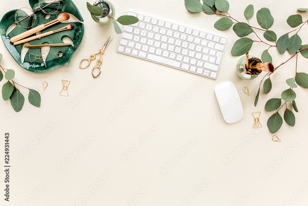 Flat lay home office desk. Female workspace with computer, plate (sheet  monstera), golden accessories, eucalyptus leaves, on beige background. Top  view feminine background. Photos | Adobe Stock