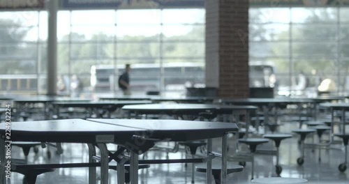 High School Cafeteria with Students Walking by on their way to Class photo