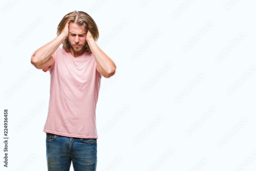 Young handsome man with long hair over isolated background suffering from headache desperate and stressed because pain and migraine. Hands on head. Young handsome man with long hair over isolated background suffering from headache desperate and stressed because pain and migraine. Hands on head.
