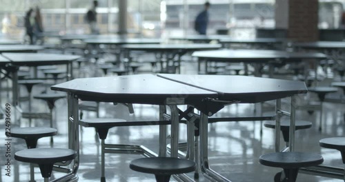 High School Cafeteria with Students Walking by on their way to Class photo