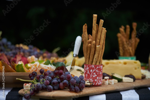 Party table at the garden. Table Food Lunch Variety Outdoors decorations 