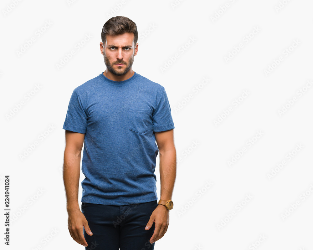 Young handsome man over isolated background skeptic and nervous, frowning upset because of problem. Negative person. Young handsome man over isolated background skeptic and nervous, frowning upset because of problem. Negative person.