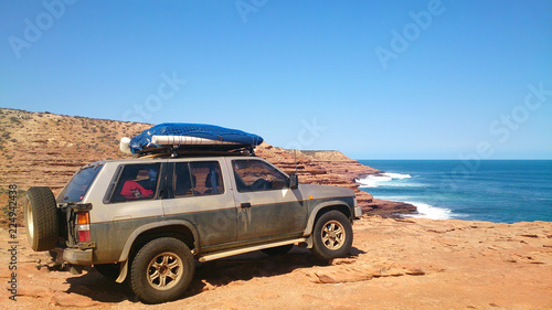 Off-road verhicle on a lonely costline beach © PHOTOWORLD