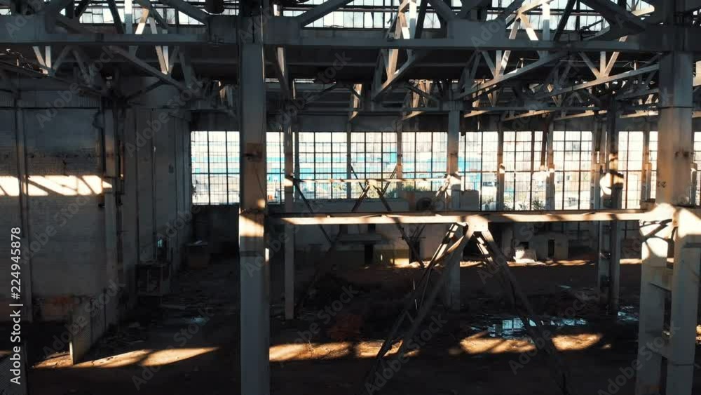 Abandoned and haunted industrial creepy warehouse inside, old ruined grunge factory building, shot from drone flying inside, toned Abandoned and haunted industrial creepy warehouse inside, old ruined grunge factory building, shot from drone flying inside, toned