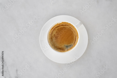 A cup of coffee on marble background