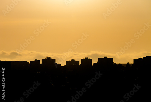 Silhouetted Building Tops at Sunset