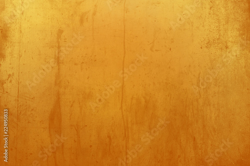 abtract grunge surface orange gold background golden yellow highlights