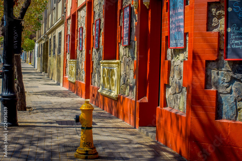 Outdoor view of trees shadows in the Barrio Yungay in Santiago, capital of Chile photo