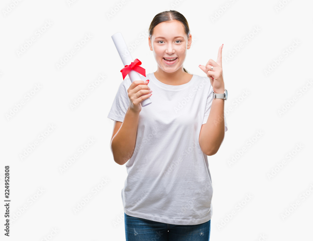 Young caucasian woman holding degree over isolated background surprised with an idea or question pointing finger with happy face, number one Young caucasian woman holding degree over isolated background surprised with an idea or question pointing finger with happy face, number one