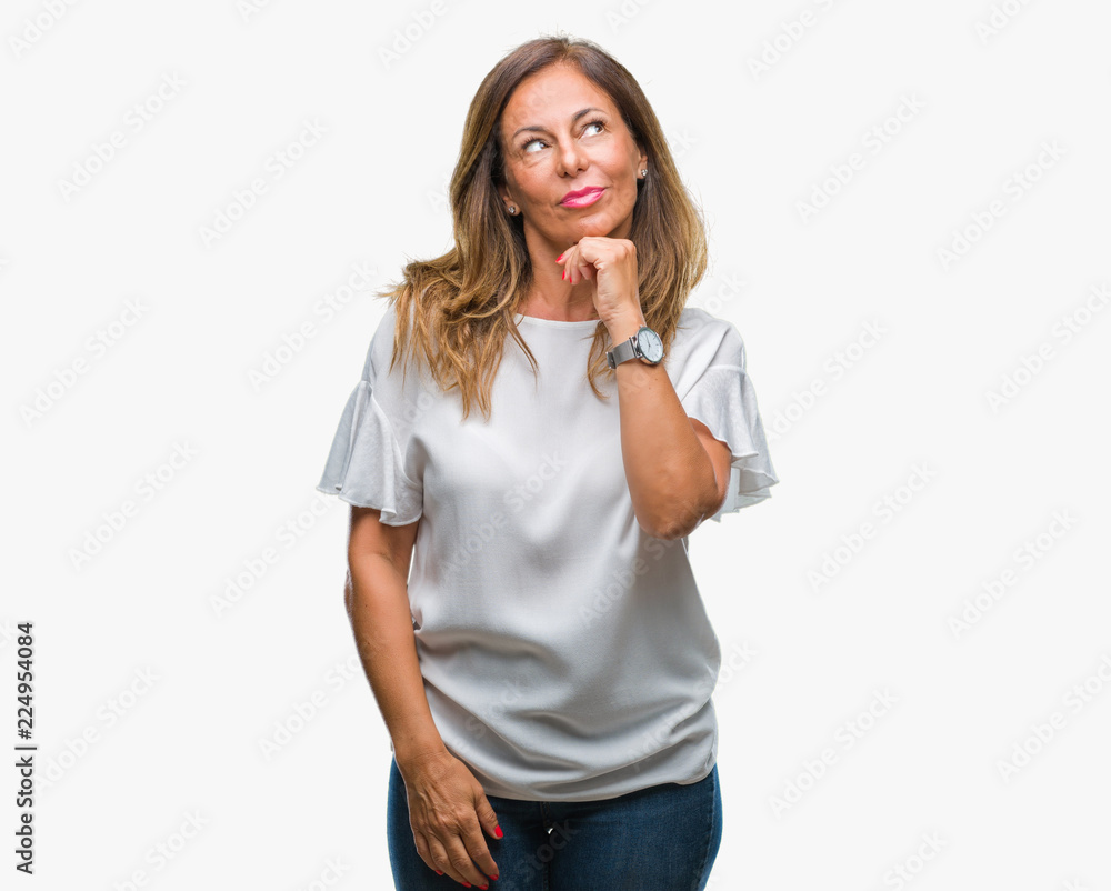 Middle age senior hispanic woman over isolated background with hand on chin thinking about question, pensive expression. Smiling with thoughtful face. Doubt concept. Middle age senior hispanic woman over isolated background with hand on chin thinking about question, pensive expression. Smiling with thoughtful face. Doubt concept.