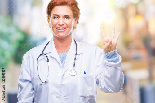 Senior caucasian doctor woman wearing medical uniform over isolated background showing and pointing up with fingers number four while smiling confident and happy.