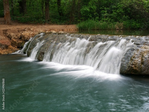 Fototapeta Naklejka Na Ścianę i Meble -  This waterfalls in Chickasaw National Recreation Area in Sulphur is dubbed as the “Little Niagara” of Oklahoma.