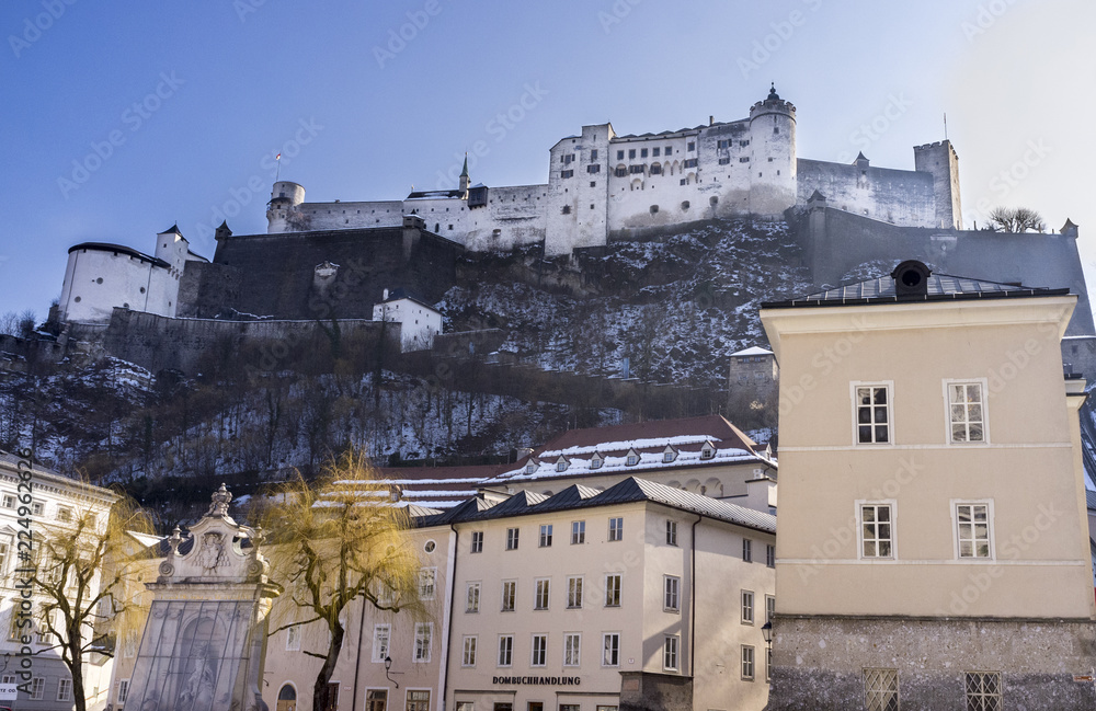 Hohensalzburg Castle, Salzburg, Austria viewed from the town below in late afternoon light