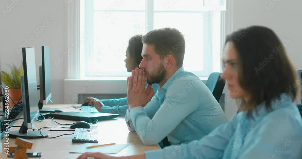 Stressful mid 30s Caucasian male working in the office, trying to find the solution. 4K UHD 60 FPS SLOW MOTION Stressful mid 30s Caucasian male working in the office, trying to find the solution. 4K UHD 60 FPS SLOW MOTION
