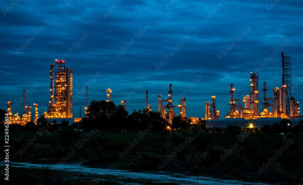 View of oil and gas refinery industry plant at twilight, Electric Generating factory at night.
