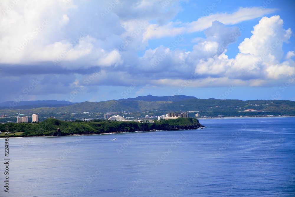 A coastal view of Guam with the business district in the distance seen from the Two Lover’s Point
