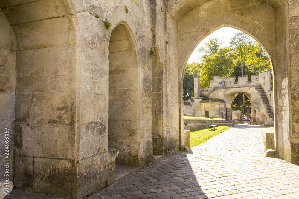 Fototapeta premium Medieval castle of Pierrefonds, Picardy, France. Arch to interior courtyard with crenelations and turrets