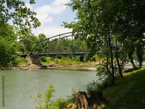 Side view of the War Eagle Mill bridge, a landmark in Rogers, and one of the most photographed in northwest Arkansas.