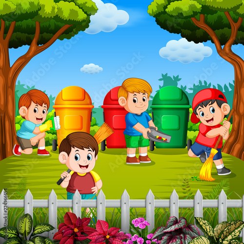 the children clean the garden and throw the trash into a bin in the three colour 
