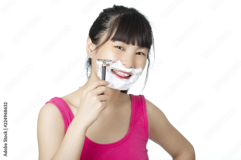 Chinese woman shaving isolated on a white background Chinese woman shaving isolated on a white background