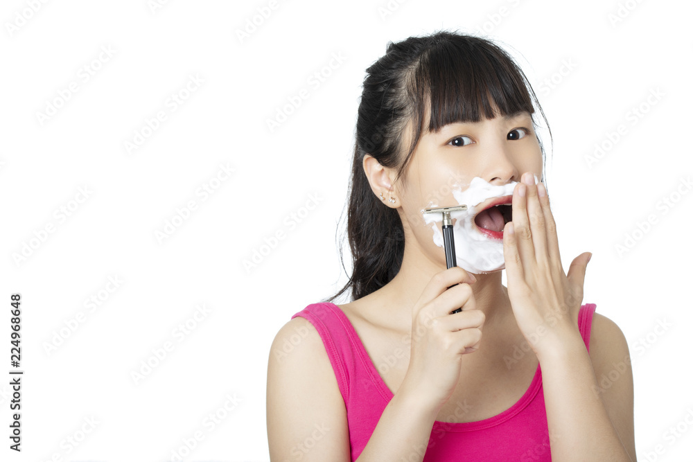 Chinese woman shaving isolated on a white background Chinese woman shaving isolated on a white background