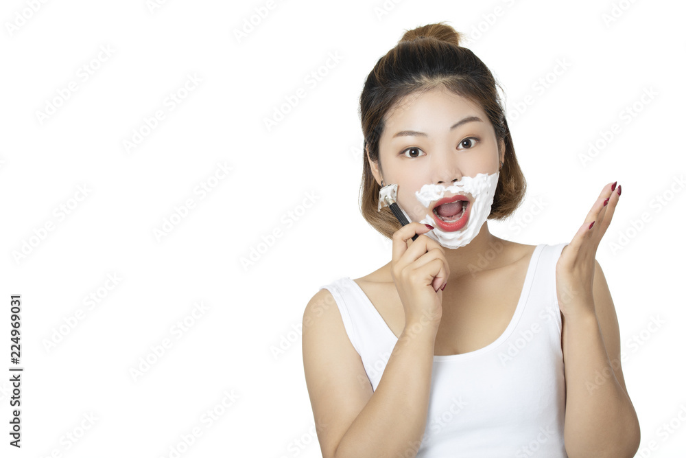 Chinese woman shaving isolated on a white background Chinese woman shaving isolated on a white background