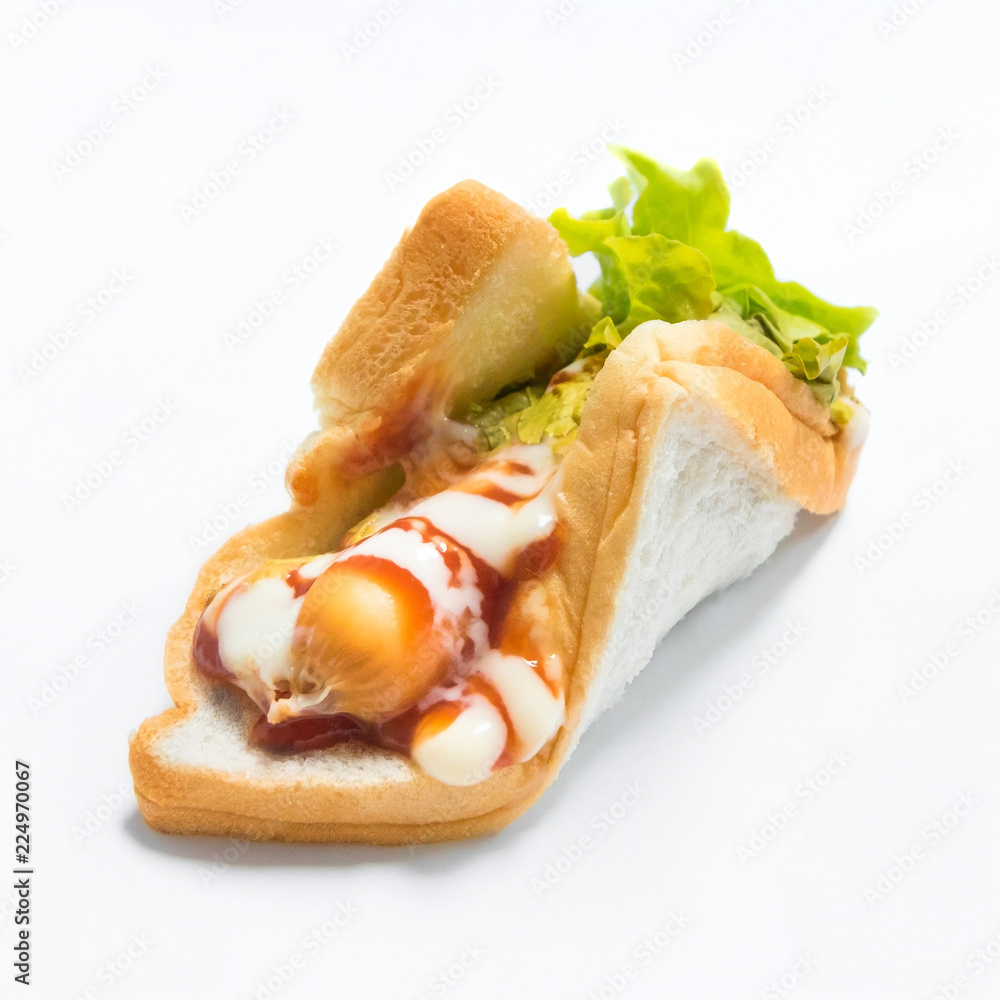 Delicious hot dog sandwich on white background. Breakfast bread for eat. Delicious hot dog sandwich on white background. Breakfast bread for eat.