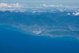 Picture of Mountains, rivers, oceans and cities taken from the plane.
