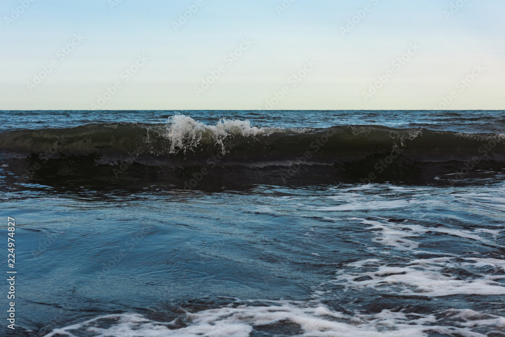 Powerful sea waves breaking, natural background