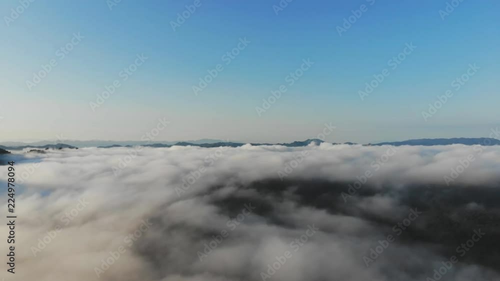 Landscape of Morning Mist with Mountain Layer at north of Thailand. Aerial View. Flying over the high mountains in beautiful clouds . Aerial video shot. Landscape of Morning Mist with Mountain Layer at north of Thailand. Aerial View. Flying over the high mountains in beautiful clouds . Aerial video shot.
