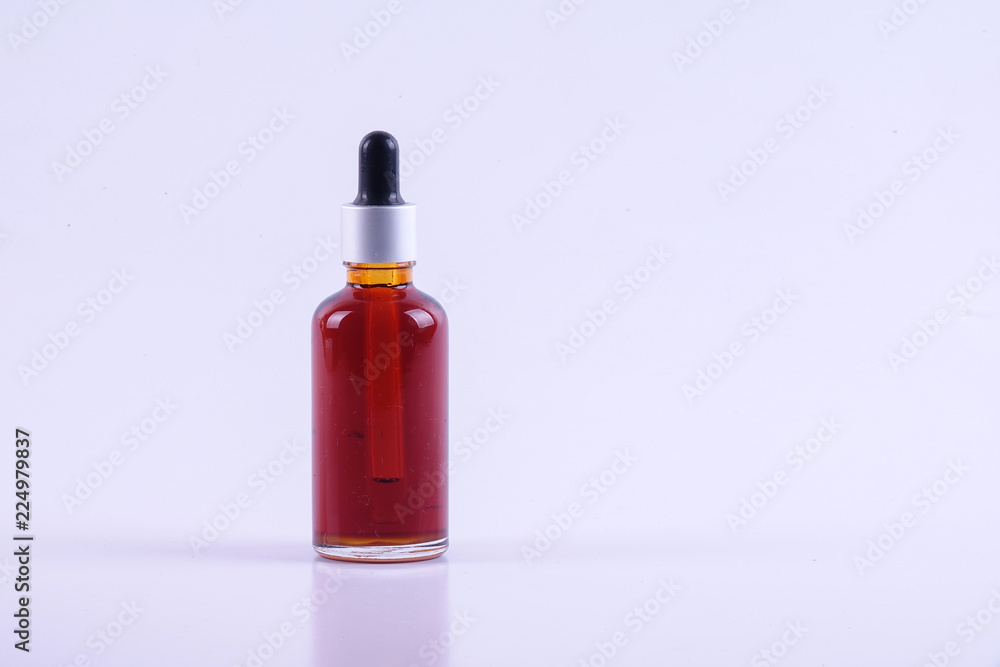 Nigella sativa or Black cumin oil over white background. Nigella sativa or Black cumin oil over white background.