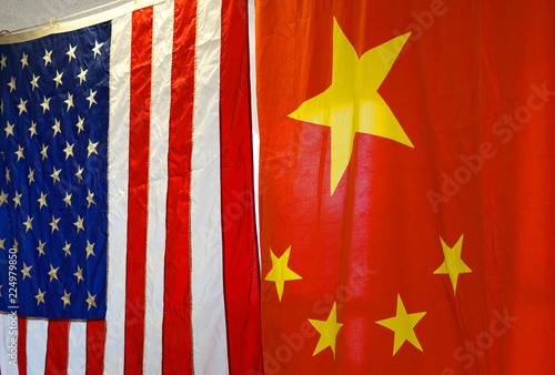 hanging national flags of China and USA photo