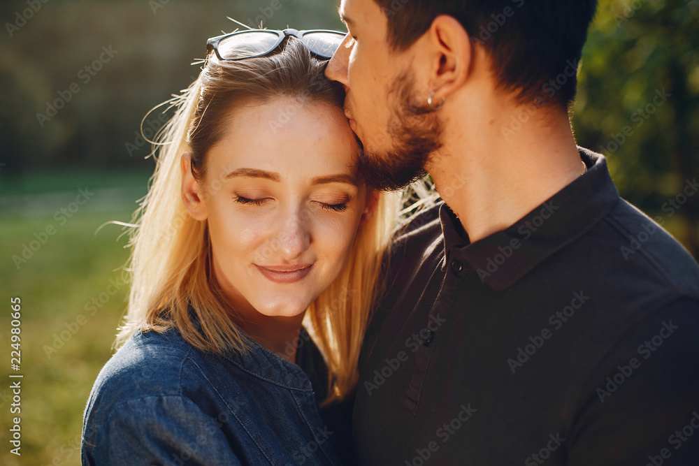 Fototapeta premium happy young couple in the park