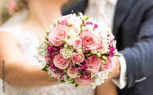 bridal bouquet with bridal couple