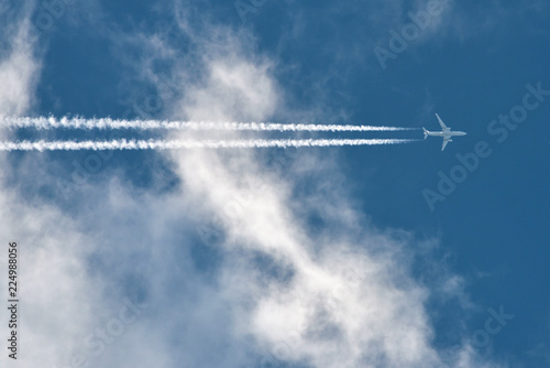 Airplane In Blue Sky